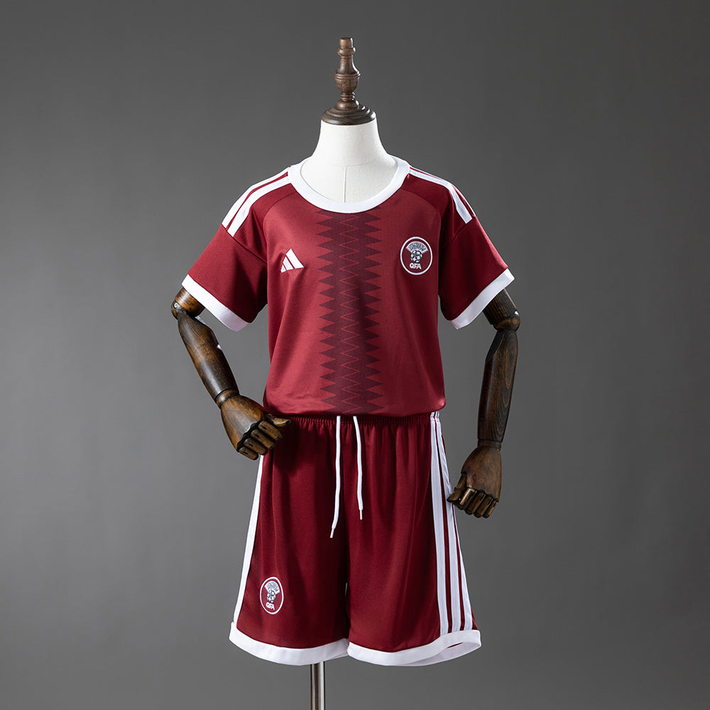 Qatar Casa 2026 - Bambino (pantaloncini inclusi)